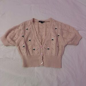 Pink and white cardigan slightly cropped